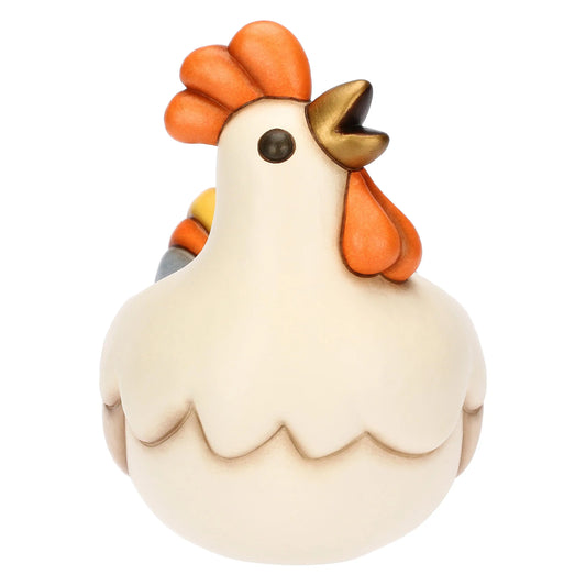 Cachepot in ceramica Thun a forma di gallo della collezione Incanto di Pasqua. Il contenitore presenta il corpo color crema, cresta e bargigli arancioni e una coda variopinta nei toni del verde, giallo, arancio e grigio azzurro. Design cavo sul dorso ideale come porta-piantina o svuotatasche pasquale.