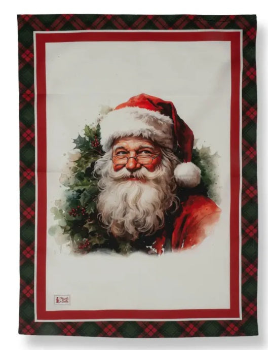 Canovaccio con il primo piano di un Babbo Natale classico con barba bianca, occhiali e cappello rosso, circondato da ghirlande di pino.