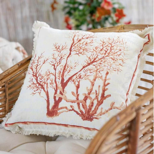 cuscino Blanc Mariclo' linea Maldive in lino naturale color beige. Stampa marina con coralli color ruggine e frange alle estremità. Tessuto d'arredo per tavole estive.