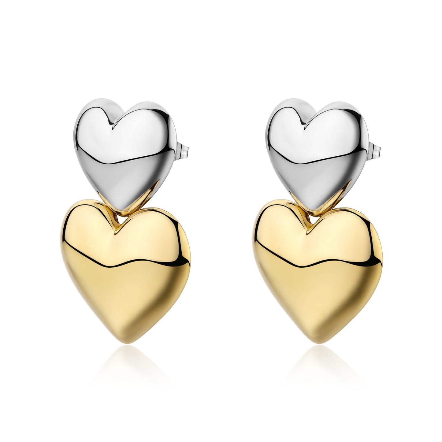 Orecchini a lobo composti da due cuori bombati sovrapposti: quello superiore in acciaio lucido silver e quello inferiore, più grande, con finitura in oro giallo 14K a contrasto.