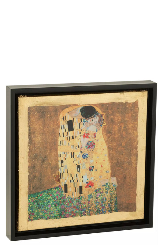 Quadro decorativo con cornice nera firmato Jolipa, che riproduce la celebre opera "Il Bacio" di Gustav Klimt impreziosita da luminosi dettagli in foglia oro. Questa raffinata stampa artistica da parete unisce l'eleganza classica del capolavoro a uno stile moderno e lussuoso, ideale per valorizzare l'arredamento del soggiorno, della camera da letto o dell'ufficio.