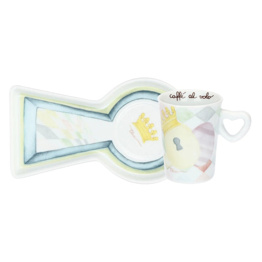 Tazzina da espresso e vassoietto coordinato in porcellana Thun della linea "Incanto di Pasqua". Il set presenta decori floreali primaverili, icone botaniche e il logo Thun in tonalità pastello su fondo bianco candido.