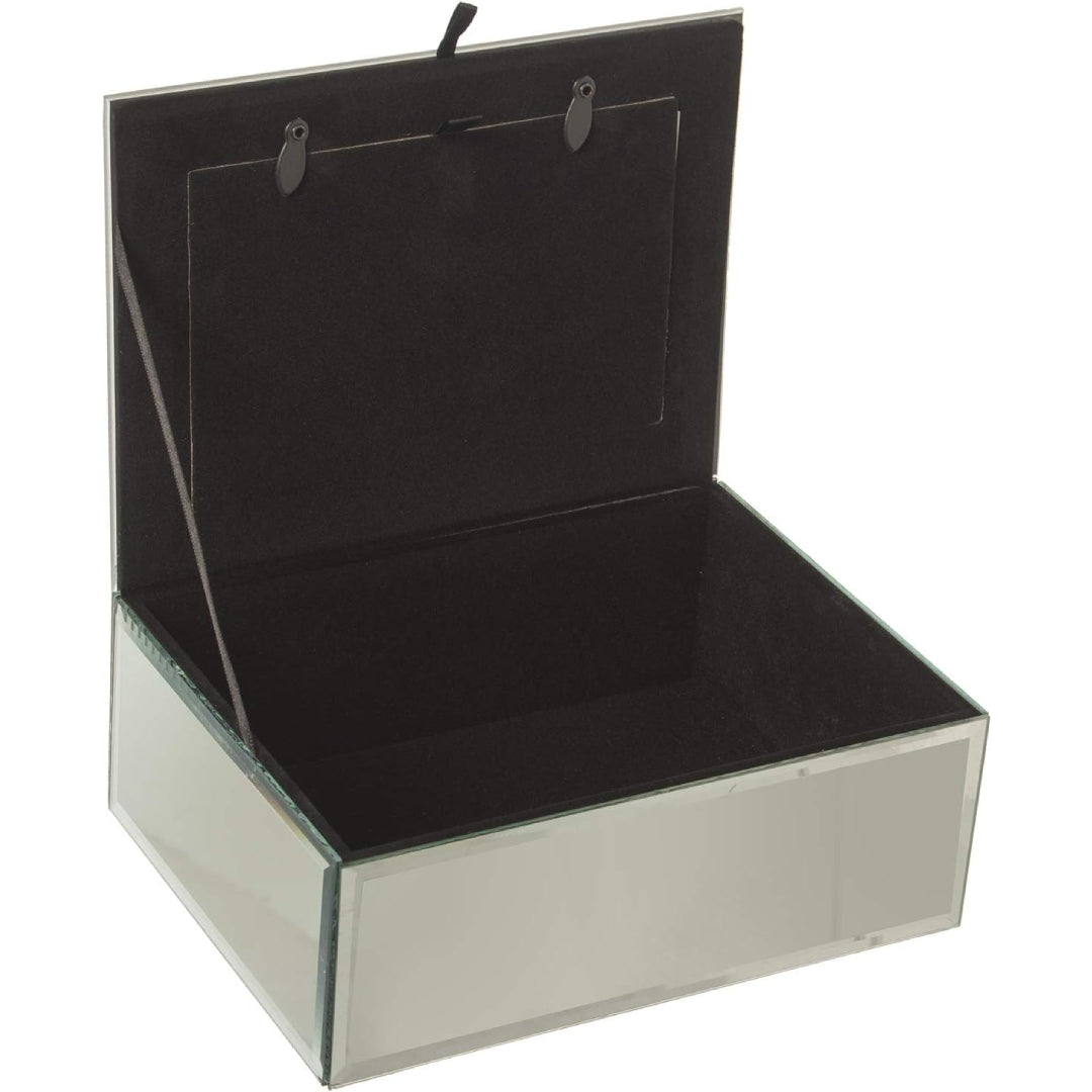 Portagioie rettangolare in vetro specchiato con coperchio a doppia funzione di cornice portafoto, incorniciato da una fascia di brillantini argentati e chiuso da un nastrino nero. Scatola portagioie elegante firmata E-Camacho, ideale come oggetto d'arredo glamour o idea regalo raffinata.