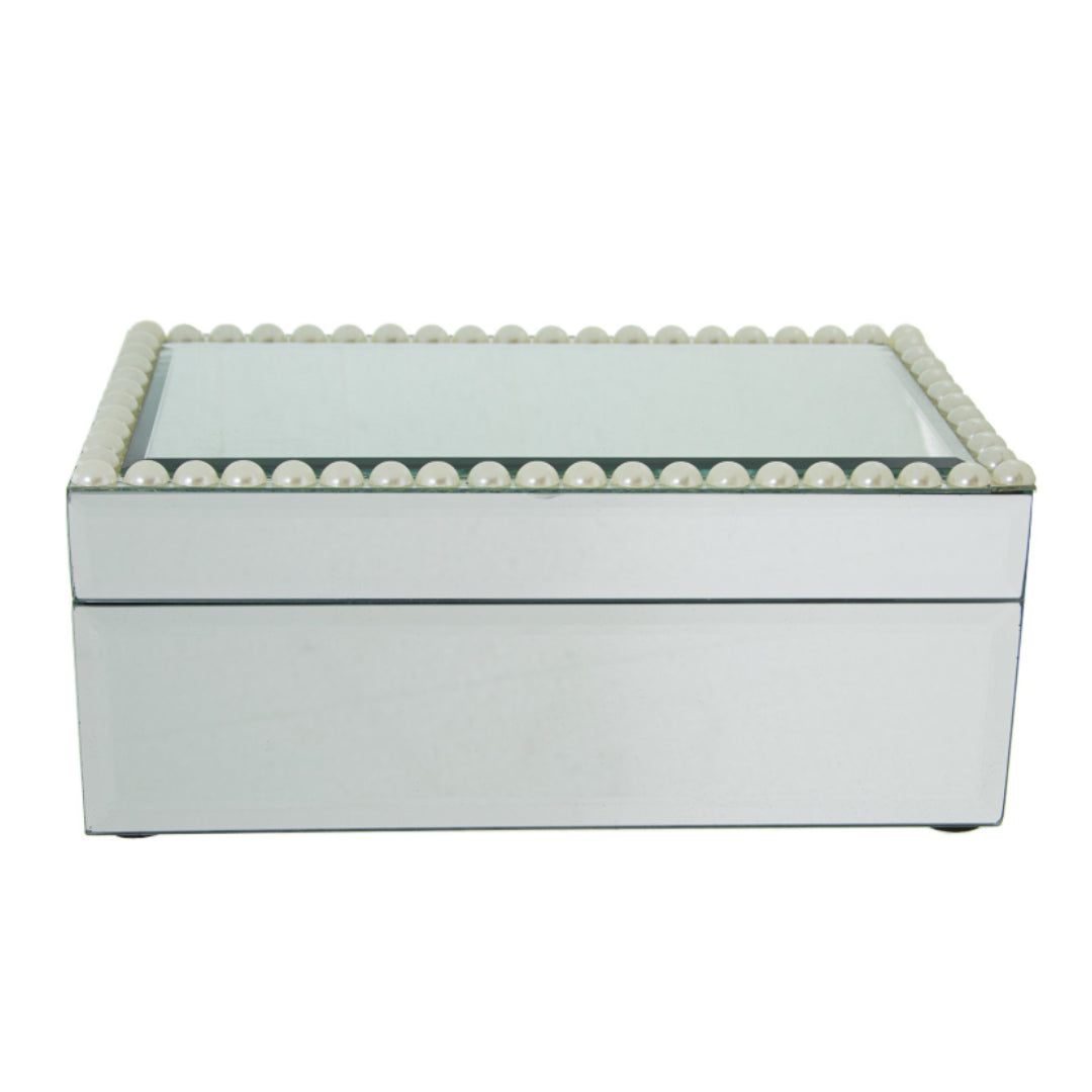 Portagioie rettangolare in vetro specchiato con coperchio bordato lungo tutto il perimetro da una fila di perle bianche. Scatola portagioie elegante firmata E-Camacho, ideale come oggetto d'arredo raffinato o idea regalo.