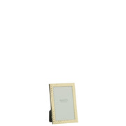 Portafoto piccolo jolipa con bordo in metallo oro martellato, adatto a foto 10x15 cm. Cornice da appoggio dal design elegante con supporto posteriore, ideale per l'arredamento della casa.