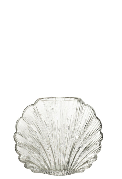 Vaso decorativo in vetro trasparente a forma di conchiglia della collezione "Oceano Azul" di Jolipa, caratterizzato da una superficie lavorata con scanalature verticali a rilievo che riflettono la luce. Questo originale complemento d'arredo di ispirazione marina è ideale per ospitare fiori freschi o come elegante centrotavola per impreziosire gli ambienti di casa.