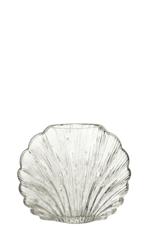 Vaso decorativo in vetro trasparente a forma di conchiglia della collezione "Oceano Azul" di Jolipa, caratterizzato da una superficie lavorata con scanalature verticali a rilievo che riflettono la luce. Questo originale complemento d'arredo di ispirazione marina è ideale per ospitare fiori freschi o come elegante centrotavola per impreziosire gli ambienti di casa.