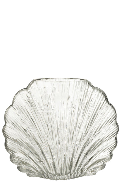 Vaso decorativo in vetro trasparente a forma di conchiglia della collezione "Oceano Azul" di Jolipa, caratterizzato da una superficie lavorata con scanalature verticali a rilievo che riflettono la luce. Questo originale complemento d'arredo di ispirazione marina è ideale per ospitare fiori freschi o come elegante centrotavola per impreziosire gli ambienti di casa.