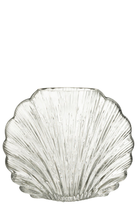 Vaso decorativo in vetro trasparente a forma di conchiglia della collezione "Oceano Azul" di Jolipa, caratterizzato da una superficie lavorata con scanalature verticali a rilievo che riflettono la luce. Questo originale complemento d'arredo di ispirazione marina è ideale per ospitare fiori freschi o come elegante centrotavola per impreziosire gli ambienti di casa.