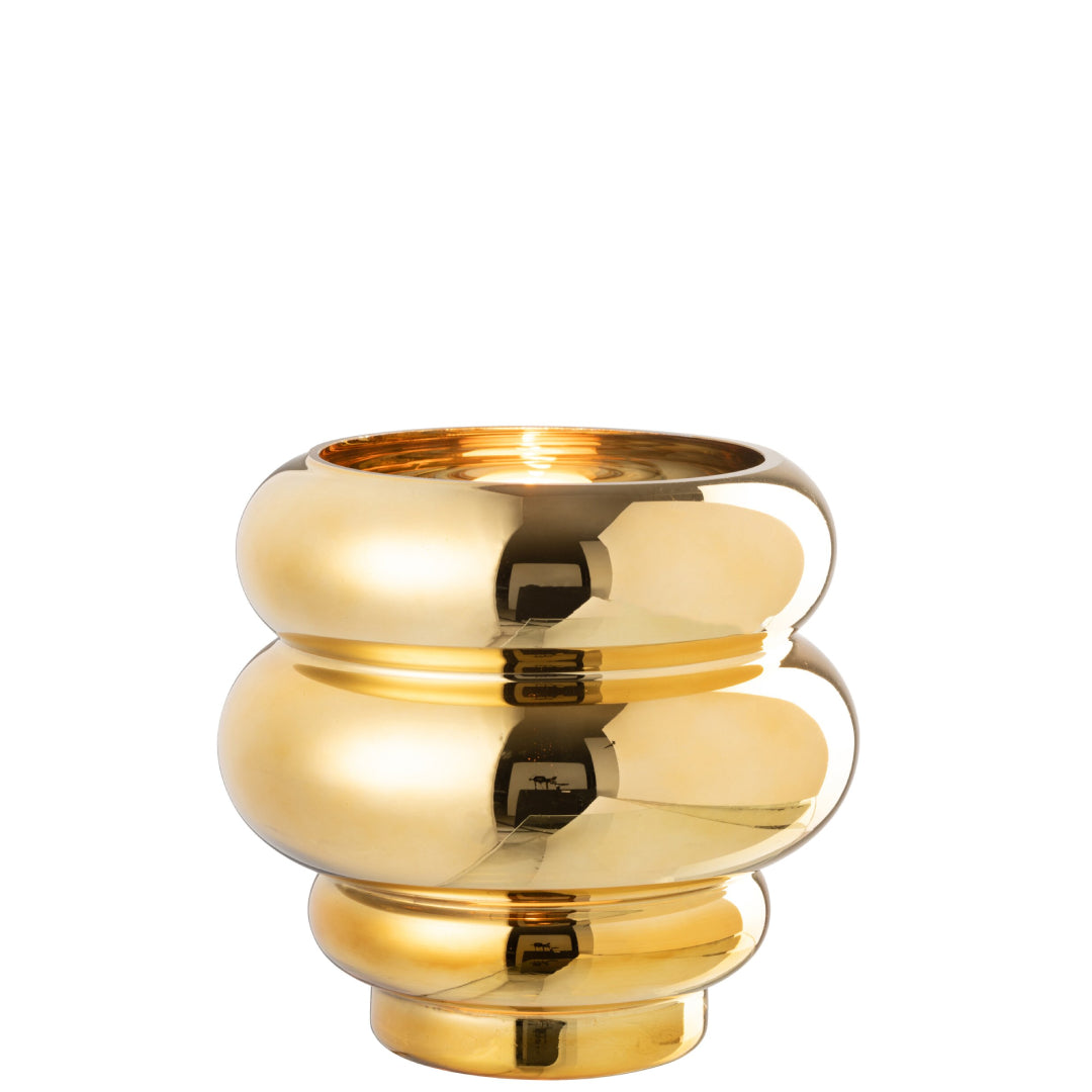 Portacandela e vaso decorativo modello Clea dorato con finitura metallica lucida a effetto specchio, caratterizzato da un design moderno e bombato a cerchi sovrapposti. Questo elegante complemento d'arredo per interni presenta una struttura sagomata a onde, ideale come centrotavola di design o vaso per fiori per arricchire la casa.
