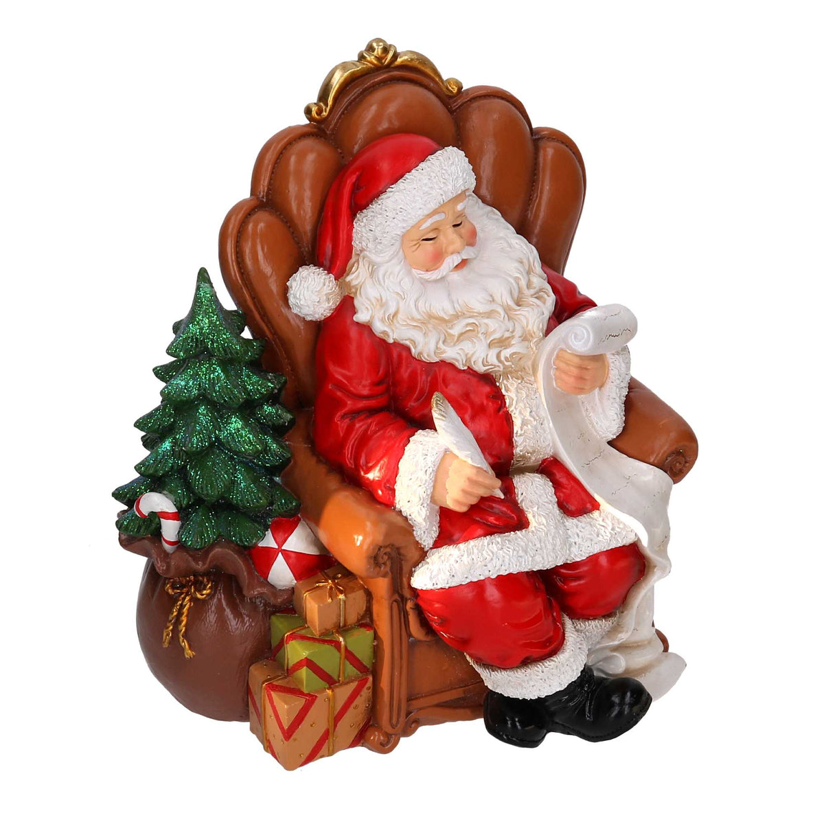 Statuina Vacchetti in resina di Babbo Natale seduto su poltrona mentre scrive la lista dei regali, con albero glitterato e pacchi colorati. Decorazione natalizia dipinta a mano, ideale per l’home décor e come idea regalo.