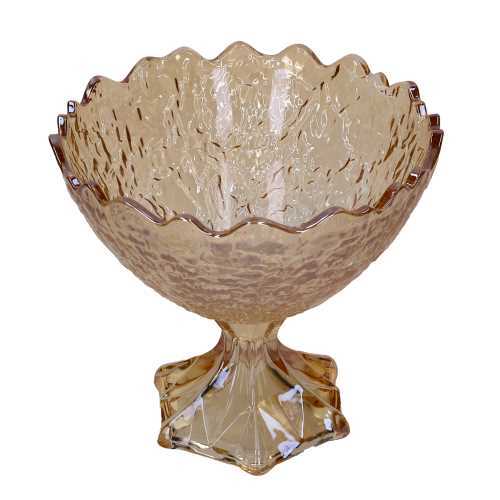 Grande alzata in vetro color ambra con coppa profonda e bordi frastagliati a punta, caratterizzata da una texture superficiale increspata e base sfaccettata.