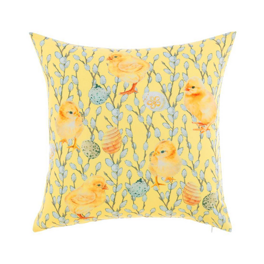 Cuscino d'arredo giallo della "Easter Collection" di Blanc Mariclo' impreziosito da una delicata fantasia pasquale con piccoli pulcini e uova colorate tra rametti primaverili. Questo complemento tessile quadrato è ideale per decorare divani, poltrone o sedie portando un'atmosfera festosa e country chic in soggiorno o in cucina.