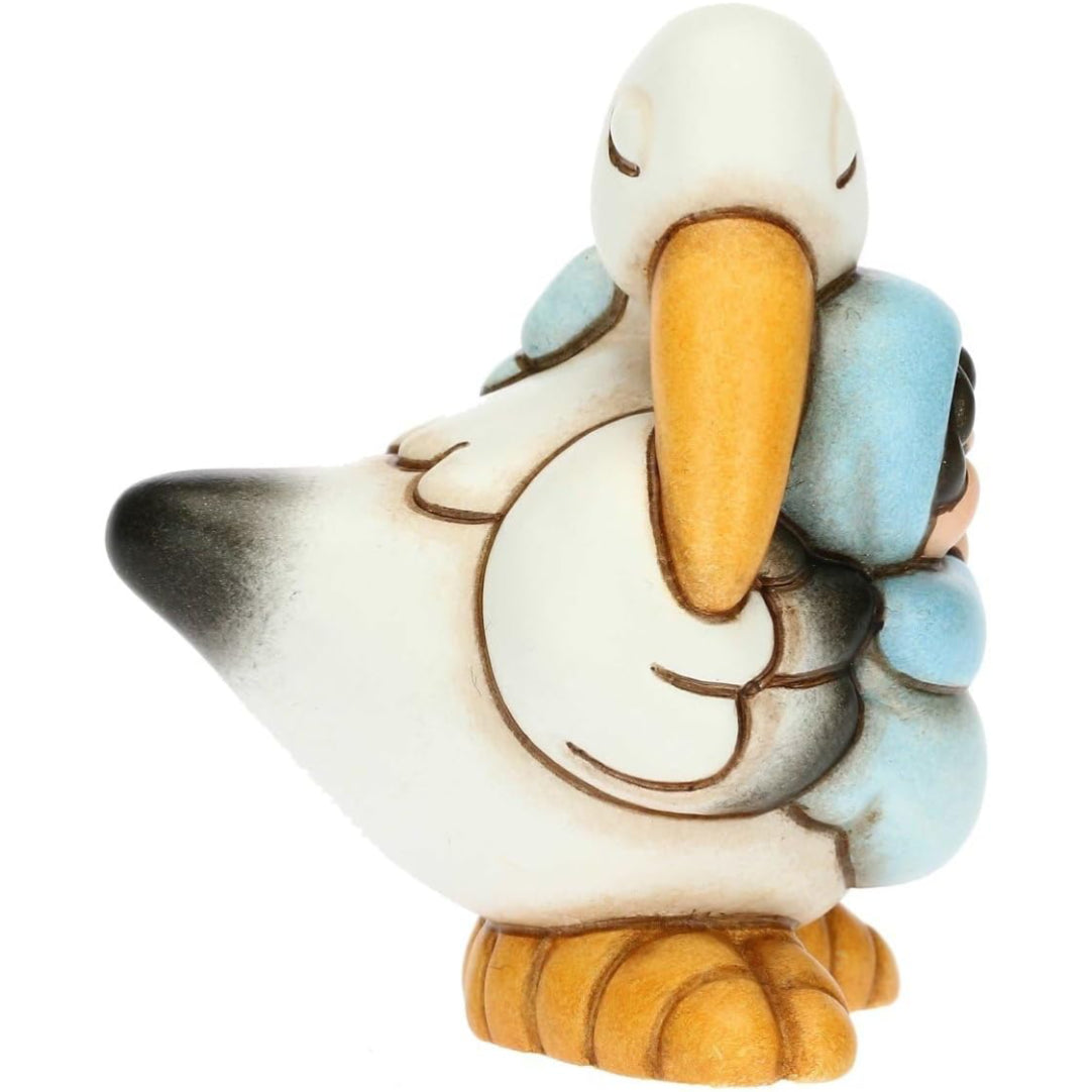 Dolce Cicogna che Porta un Bimbo in Ceramica, Lui