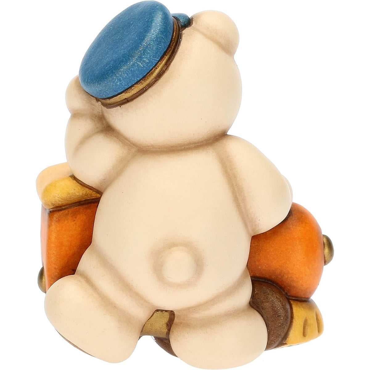 Statuina in ceramica raffigurante un orsetto teddy seduto su un trenino marrone, giallo e arancio. Decorazione dipinta a mano, ideale per la cameretta e come idea regalo.