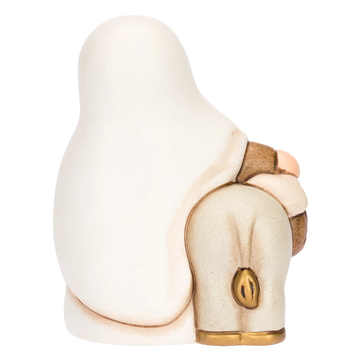 Statuina in ceramica raffigurante una donna del presepe con velo bianco e veste marrone, che accompagna un asinello con basto dorato appoggiando la mano sulla sua testa. Personaggio dal design classico e curato firmato THUN, ideale per arricchire il presepe o come idea regalo natalizia.
