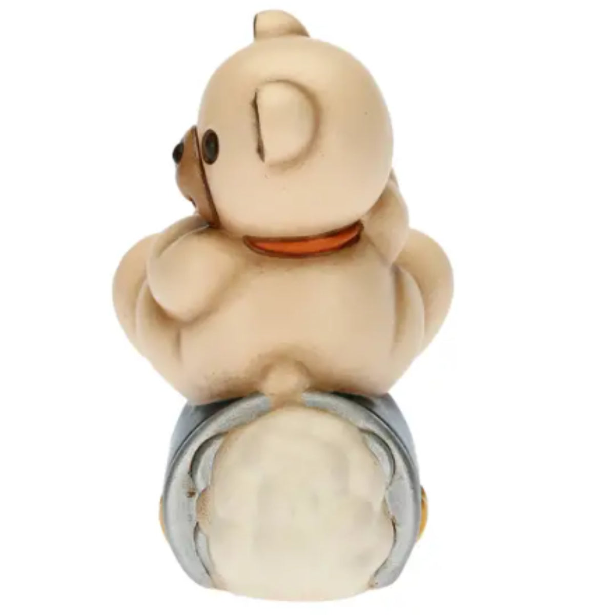 Statuina THUN in ceramica raffigurante un orsetto teddy seduto su un razzo spaziale blu con dettagli argentati e stella dorata. Decorazione dipinta a mano, ideale per la cameretta e come idea regalo.