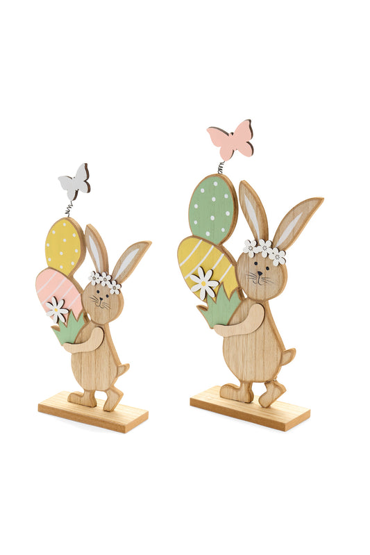 Questo set di coniglietti decorativi in legno assortiti della collezione "Rabbit PePen" di Nuvole di Stoffa è caratterizzato da uno stile bidimensionale essenziale e poetico. Realizzati in legno con una finitura naturale e anticata, questi elementi decorativi presentano silhouette sagomate arricchite da dettagli romantici