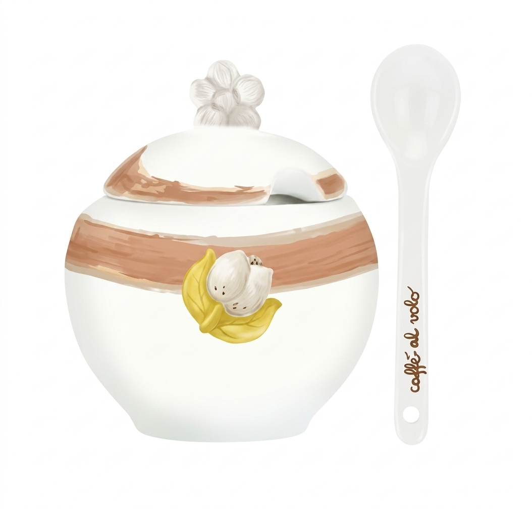 La Zuccheriera con Cucchiaio Tulipani è un elegante accessorio in porcellana bianca decorato con pennellate ambra e un tulipano in rilievo dalle foglie dorate. Il set include un pratico cucchiaino coordinato con la scritta "caffè al volo", rendendolo un complemento d'arredo funzionale e una perfetta idea regalo per amanti del design floreale.