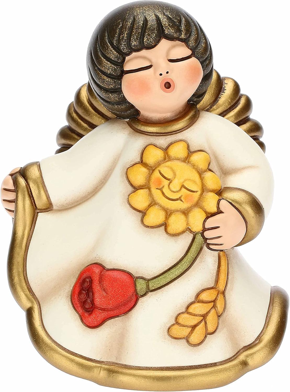 Statuina in ceramica Thun dell'Angelo della Mamma, Limited Edition "Giardino della Vita". L'angelo ha gli occhi chiusi, ali dorate e capelli castani sfumati; indossa una veste color crema con bordi dorati e tiene tra le mani un grande girasole sorridente, un tulipano rosso e una spiga di grano. Design iconico Thun con forme morbide e dettagli decorati a mano.