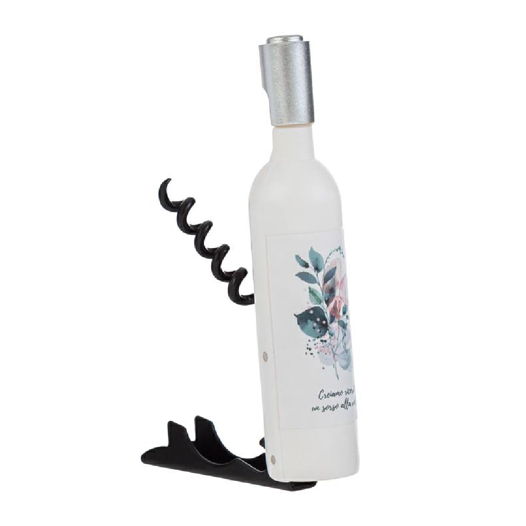 Apribottiglie a calamita a forma di mini bottiglia bianca decorata con motivo floreale acquerello nei toni rosa e verde, tappo argentato e confezione trasparente con etichetta "Two Function Bottle Opener". Simpatico apribottiglie multifunzione utile anche come calamita da frigo, ideale come bomboniera o idea regalo originale.
