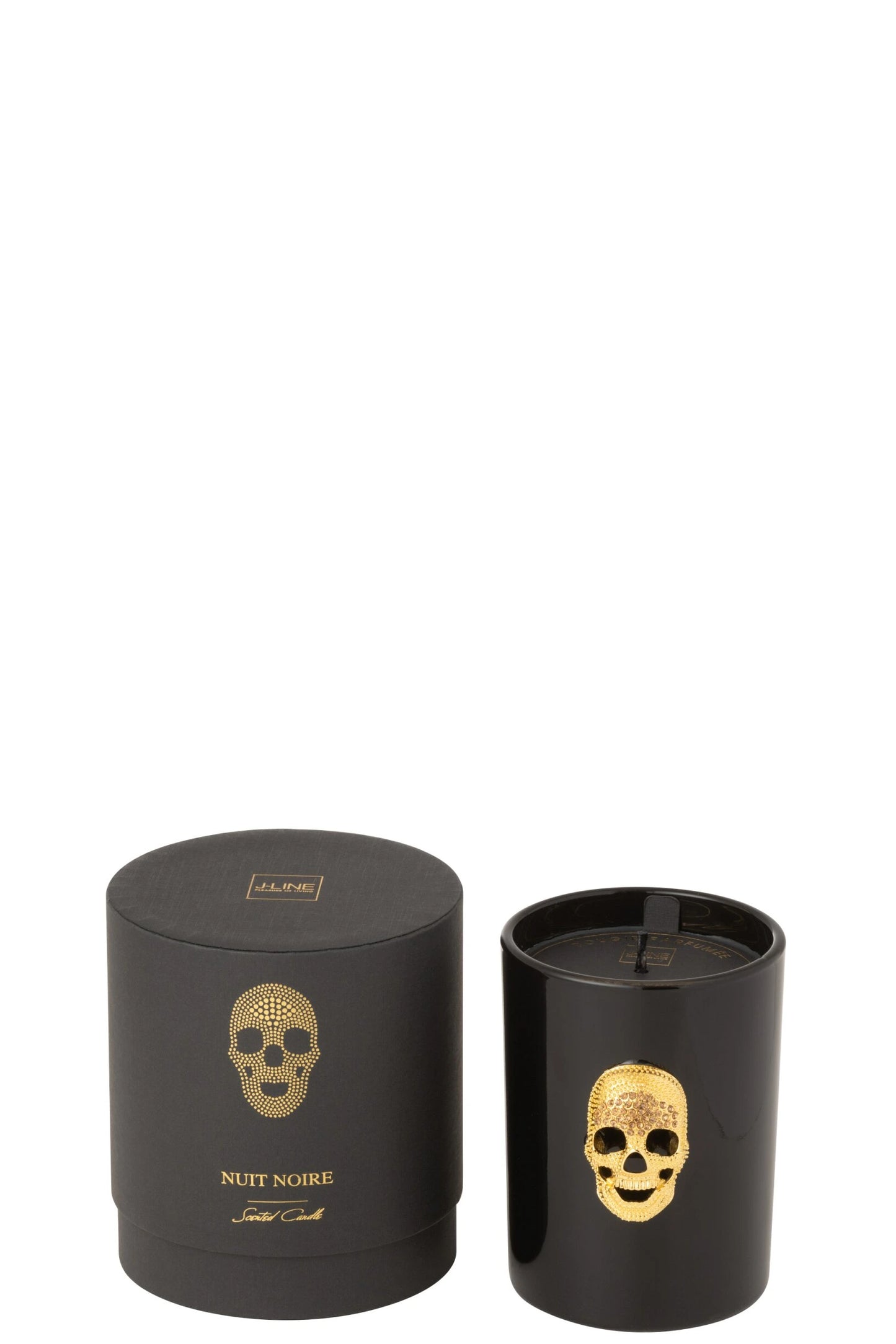Candela profumata "Cranio" Nuit Noire firmata Jolipa, caratterizzata da un elegante bicchiere in vetro nero lucido impreziosito da un teschio dorato in rilievo sulla parte frontale. Questa esclusiva candela decorativa di lusso è accompagnata dalla sua confezione regalo cilindrica coordinata total black con dettagli in oro, ideale per profumare la casa e creare un'atmosfera moderna, audace e sofisticata.