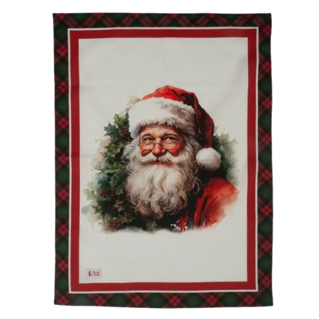 Canovaccio con il primo piano di un Babbo Natale classico con barba bianca, occhiali e cappello rosso, circondato da ghirlande di pino.