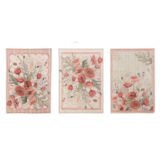 Canovaccio in tre varianti Blanc Mariclo' linea Coquelicot con stampa di papaveri rossi e boccioli. Cornice decorativa a righe verticali rosse con piccoli cuori. Design floreale elegante in stile country chic.