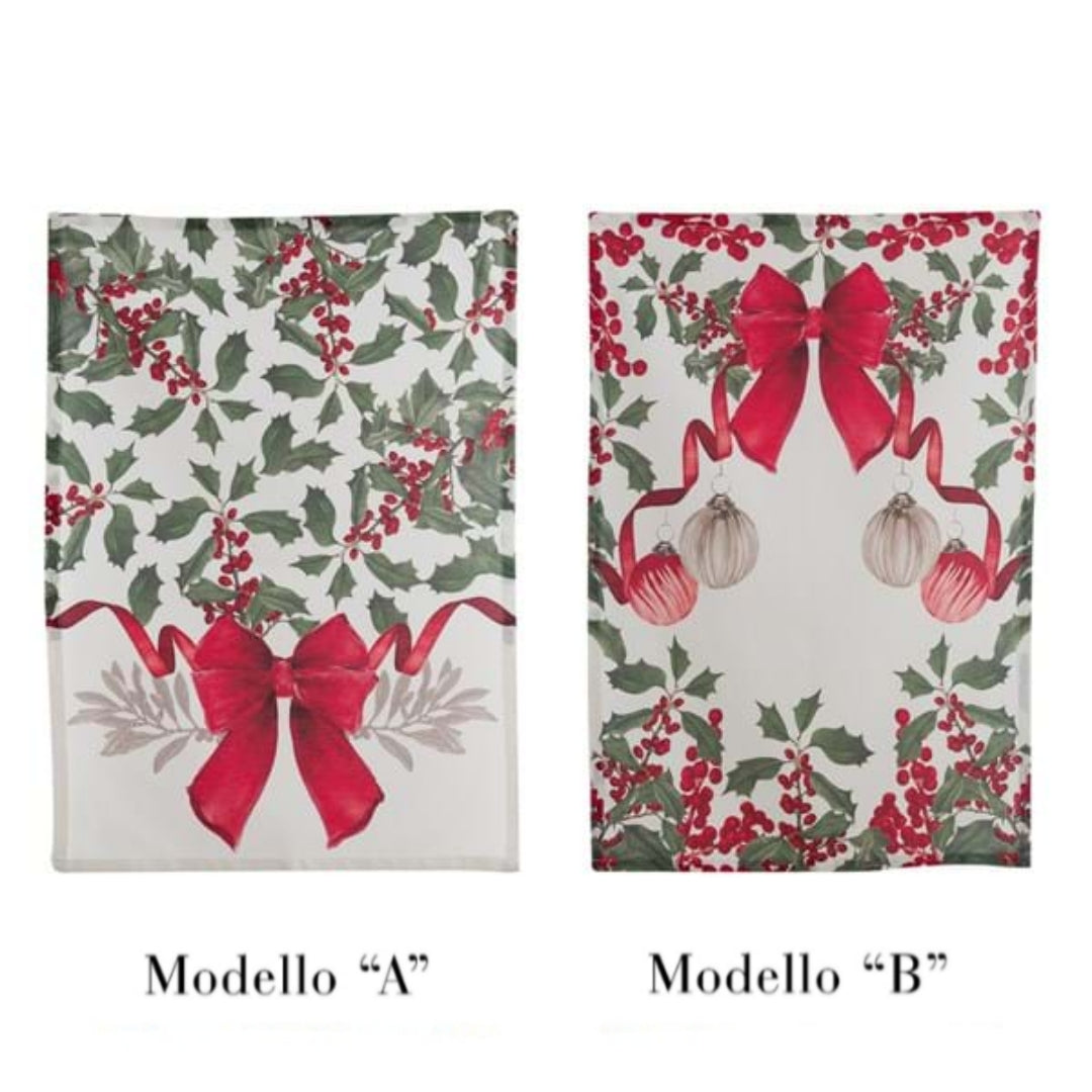 Set di due canovacci natalizi Blanc Mariclò su sfondo bianco. Il modello A presenta agrifoglio e un grande fiocco rosso in basso; il modello B mostra un fiocco con palline di Natale appese.