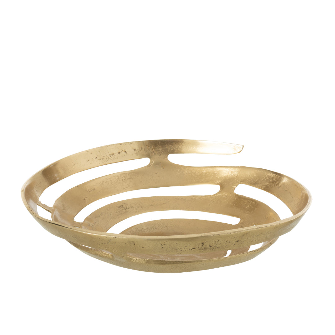 Ciotola decorativa in alluminio color oro con un particolare design a fasce curve orizzontali e spazi vuoti. La finitura superficiale è materica e leggermente irregolare.