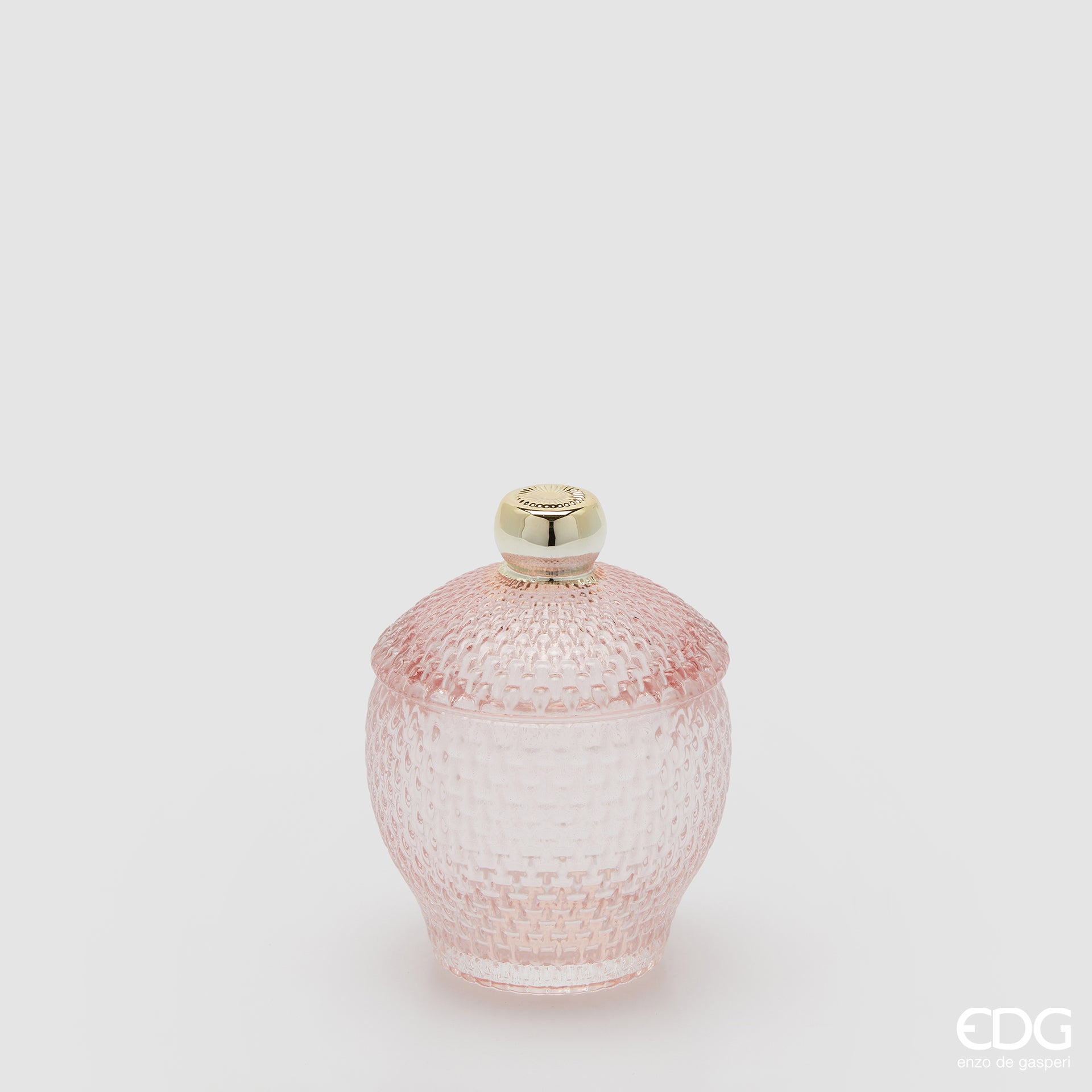Contenitore decorativo EDG Enzo de Gasperi in vetro rosa lavorato con trama a rilievo. Design bombato con coperchio coordinato e pomello dorato, ideale come portaoggetti o elemento d'arredo.