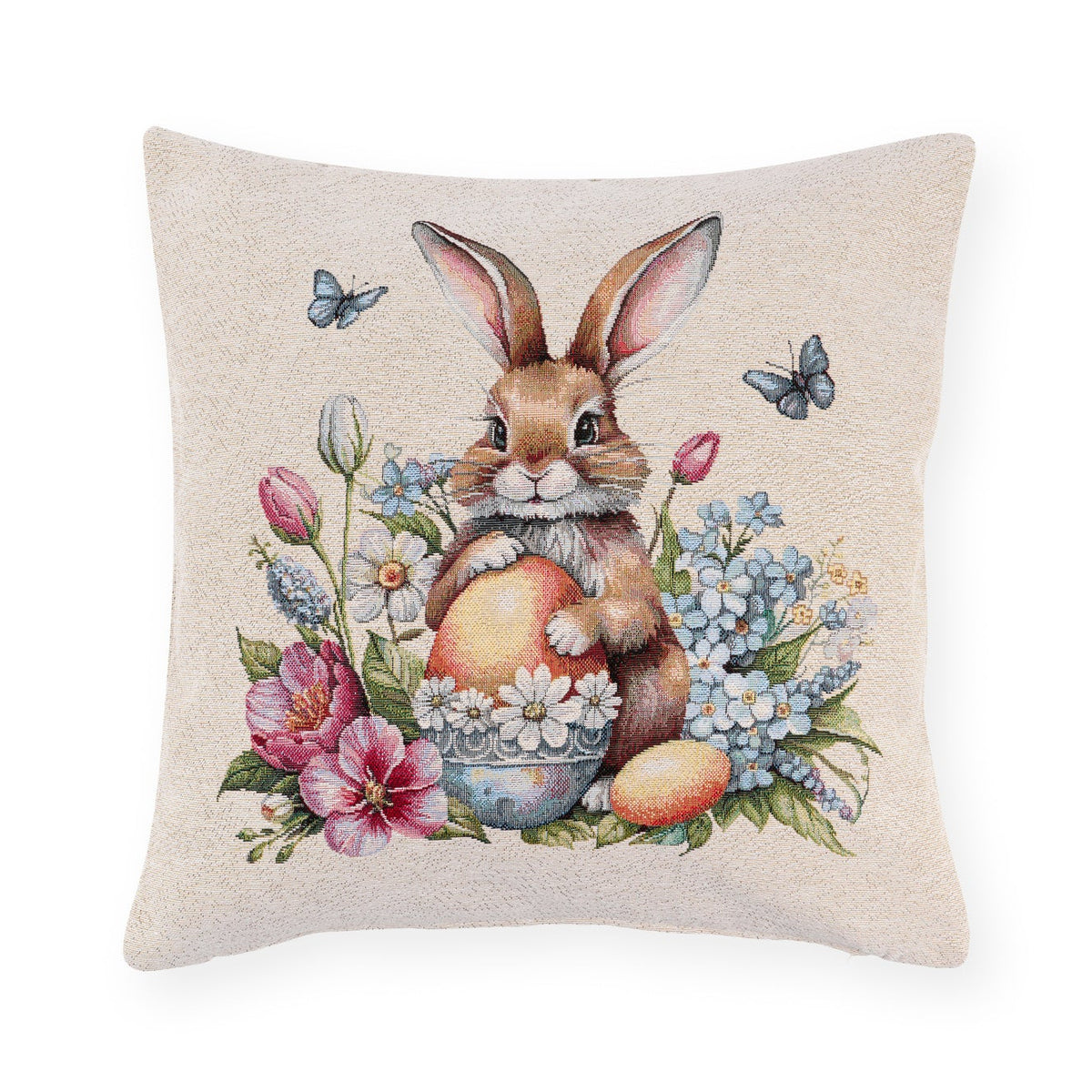 Cuscino pasquale Nuvole di Stoffa i con sfondo beige. Decorazione centrale con illustrazioni vintage di coniglietti, fiori e uova di pasqua. Tessuto elegante per la casa di Pasqua 2026.