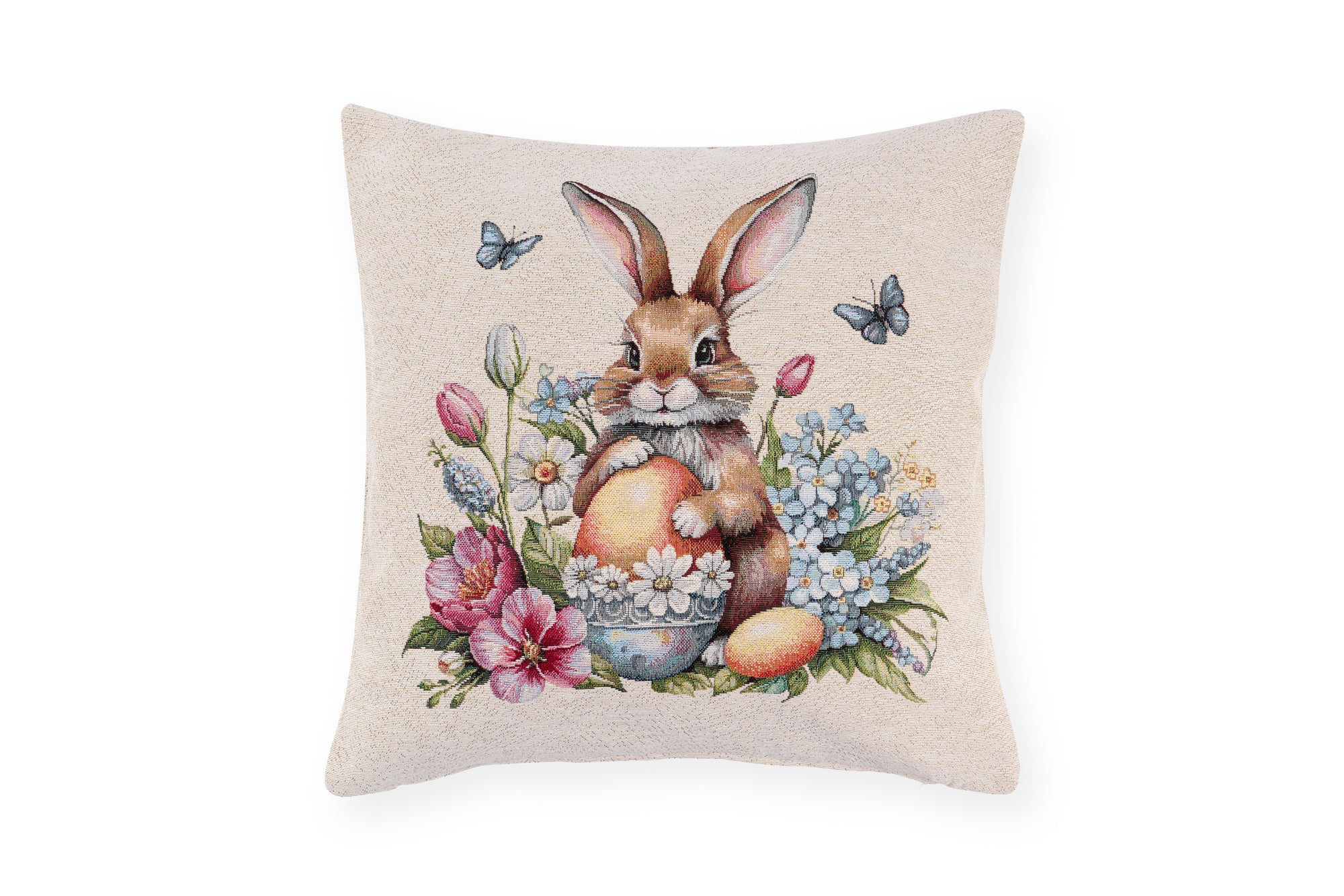 Cuscino pasquale Nuvole di Stoffa i con sfondo beige. Decorazione centrale con illustrazioni vintage di coniglietti, fiori e uova di pasqua. Tessuto elegante per la casa di Pasqua 2026.