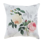 Cuscino decorativo bianco con stampa floreale di rose bianche e rosa in stile botanico classico.