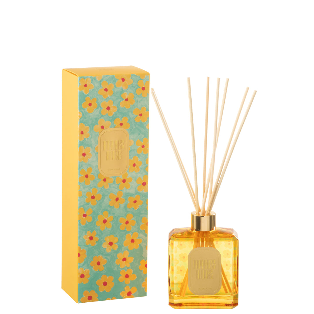 Il Diffusore per Ambienti "Happiness Blooms" Giallo Jolipa è un solare e vivace set di profumazione per la casa che esprime allegria fin dal primo sguardo. Il flacone in vetro trasparente, riempito con una fragranza dalle calde sfumature dorate, è decorato sul retro con un pattern floreale pop e completato da una lussuosa ghiera metallica lucida color oro e bastoncini in legno chiaro. Una targhetta dorata frontale ed elegante sigilla il design della boccetta. 