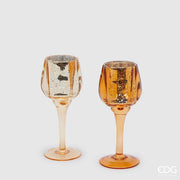 Candelabro a calice EDG in vetro oro / ambracon coppa dalla finitura martellata e lungo stelo su base rotonda. Portacandela elegante, ideale per l’home décor e come idea regalo.