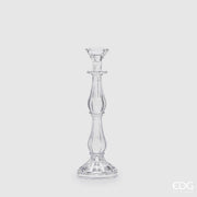 Candelabro in vetro trasparente modello Crystal grande firmato EDG Enzo de Gasperi, caratterizzato da uno sviluppo verticale slanciato con fusto sinuoso a più sezioni e scanalature decorative. Questo elegante portacandele di design presenta una base circolare lavorata dal gusto classico, ideale come centrotavola raffinato per illuminare e impreziosire gli ambienti di casa.