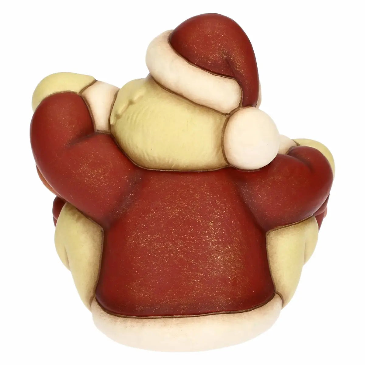 Questa immagine mostra il retro della statuina, dominato dal colore rosso scuro del vestito o della base del Grinch. La parte posteriore è liscia e tondeggiante, con il cappello natalizio che termina in un pompon bianco appoggiato sulla spalla. Sono visibili i bordi in pelliccia bianca alla base e sul collo, che creano un contrasto netto con il rosso del corpo. La finitura appare uniforme, con leggere puntinature dorate che donano lucentezza alla superficie ceramica.