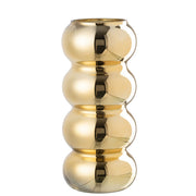 Vaso Bruco dorato con una lussuosa finitura metallica lucida a effetto specchio, caratterizzato da uno sviluppo verticale slanciato e un design moderno a quattro moduli sferici sovrapposti. Questo elegante complemento d'arredo per interni si sviluppa con una caratteristica forma sagomata a onde, ideale sia come vaso per fiori a stelo lungo sia come elemento decorativo di design per impreziosire la casa.