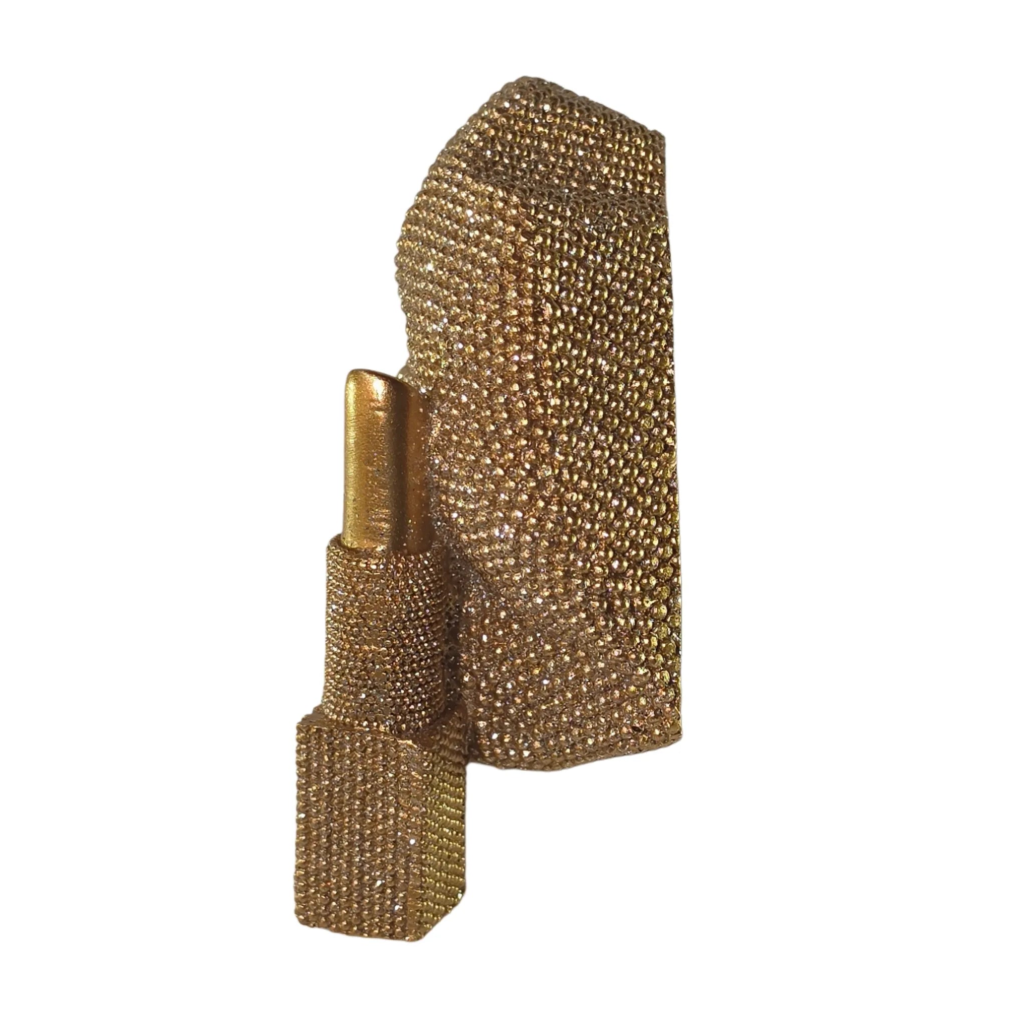Statuina in resina raffigurante labbra dorate socchiuse con accanto un rossetto abbinato, interamente ricoperti di brillantini glitterati dall'effetto scintillante. Oggetto decorativo glamour firmato Sud Import, ideale come soprammobile per il beauty o idea regalo originale.