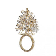 Portatovagliolo ad anello decorato con albero firmato Blanc Mariclo', caratterizzato da una brillante composizione superiore a forma di albero di Natale impreziosita da lucenti perline, cristalli sfaccettati e tubicini trasparenti e dorati con una stella sulla punta. Questo raffinato accessorio per la tavola delle feste presenta una struttura circolare finemente rivestita da piccoli elementi scintillanti coordinati, ideale per impreziosire i tovaglioli di tessuto e donare un tocco di luce ed eleganza magica