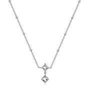 La collana "Luce" di S'Agapõ  completa perfettamente la parure con un design raffinato che gioca sulla geometria e sulla rifrazione luminosa.
