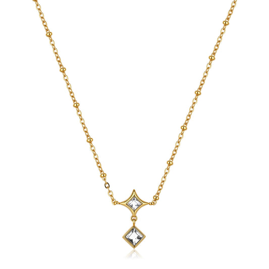 La collana "Luce" di S'Agapõ  completa perfettamente la parure con un design raffinato che gioca sulla geometria e sulla rifrazione luminosa.