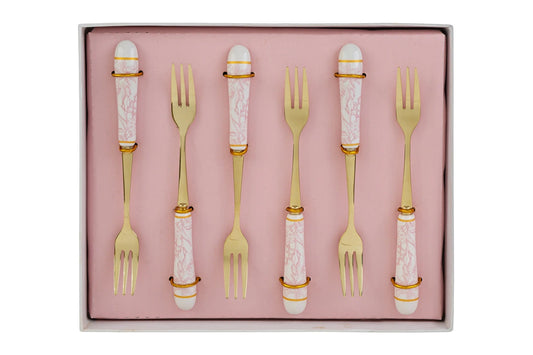 Set di 6 forchettine da dolce con decoro rosa firmato Le Stelle, caratterizzato da rebbi in metallo color oro e raffinati manici in porcellana bianca decorati con delicati motivi floreali rosa. Questo elegante servizio di posate da dessert di design è accompagnato dalla sua scatola regalo quadrata coordinata con la stessa fantasia botanica, perfetto come bomboniera di classe o idea regalo home decor.