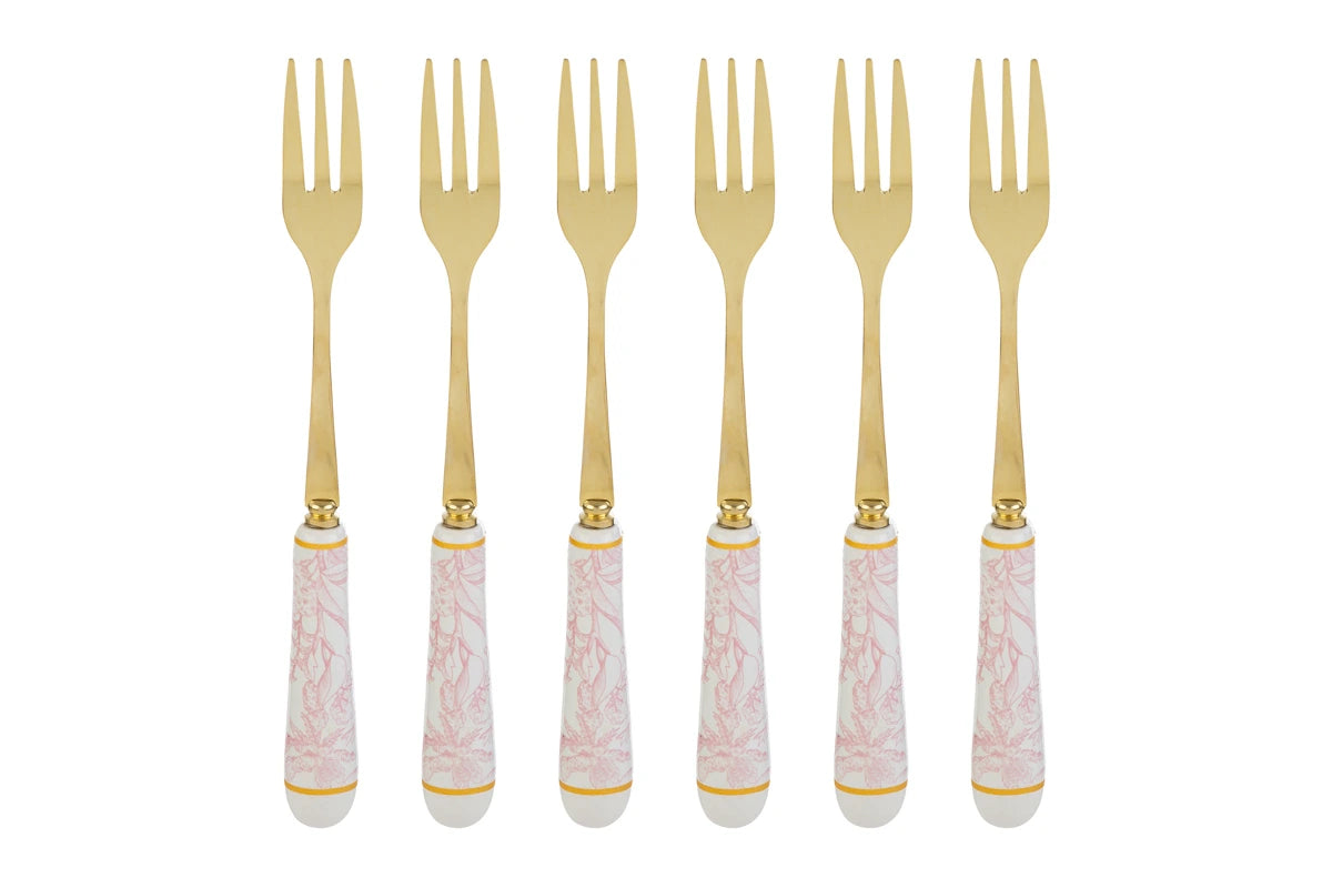 Set di 6 forchettine da dolce con decoro rosa firmato Le Stelle, caratterizzato da rebbi in metallo color oro e raffinati manici in porcellana bianca decorati con delicati motivi floreali rosa. Questo elegante servizio di posate da dessert di design è accompagnato dalla sua scatola regalo quadrata coordinata con la stessa fantasia botanica, perfetto come bomboniera di classe o idea regalo home decor.