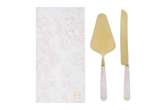 Set da servizio taglia torta da due pezzi oro con decoro rosa firmato Le Stelle, composto da una paletta e un coltello da dolci in metallo dorato con eleganti manici in porcellana bianca decorati da motivi floreali rosati. Questo raffinato set di posate per dolci è completato da una custodia regalo rettangolare coordinata con la stessa fantasia botanica, ideale come bomboniera di classe o idea regalo per occasioni speciali.
