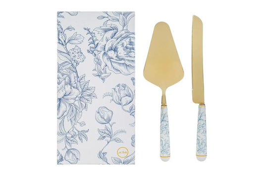 Set da servizio taglia torta da due pezzi oro con decoro azzurro firmato Le Stelle, composto da una paletta e un coltello da dolci in metallo dorato con eleganti manici in porcellana bianca decorati da motivi floreali celestini. Questo raffinato set di posate per dolci è completato da una custodia regalo rettangolare coordinata con la stessa fantasia botanica, ideale come bomboniera di classe o idea regalo per occasioni speciali.