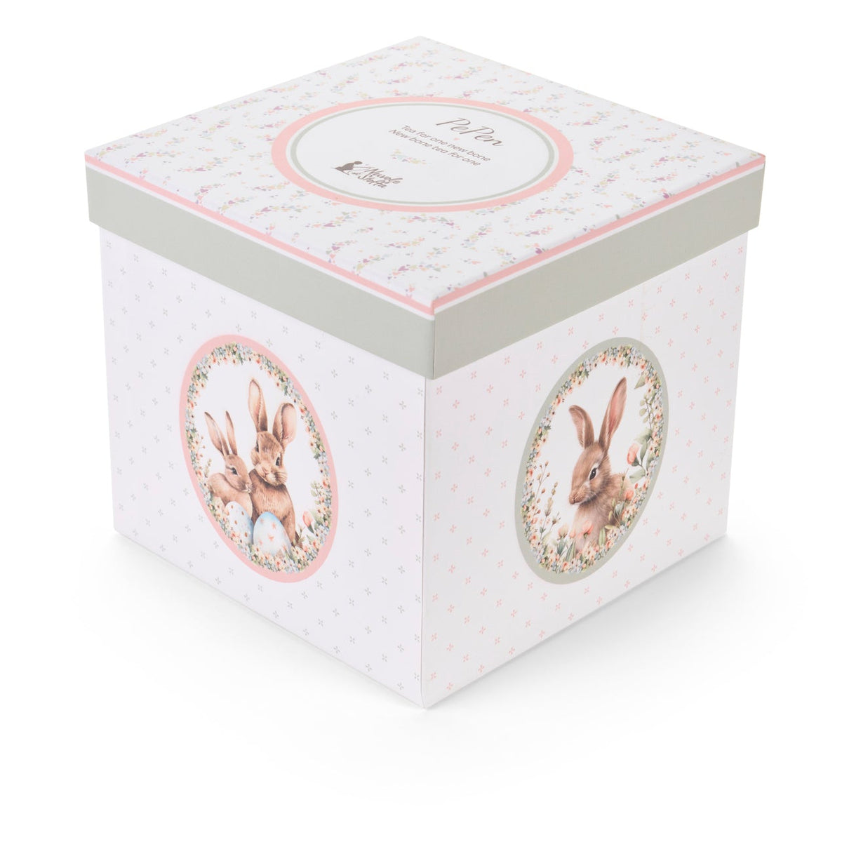 Dolce set Nuvole di Stoffa linea PePen con teiera, tazza e piattino in porcellana. Decorazione pasquale con ghirlanda di coniglietti, uova colorate e fiori di campo. Confezione regalo inclusa, stile shabby chic.