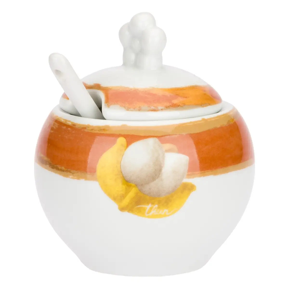 La Zuccheriera con Cucchiaio Tulipani è un elegante accessorio in porcellana bianca decorato con pennellate ambra e un tulipano in rilievo dalle foglie dorate. Il set include un pratico cucchiaino coordinato con la scritta "caffè al volo", rendendolo un complemento d'arredo funzionale e una perfetta idea regalo per amanti del design floreale.