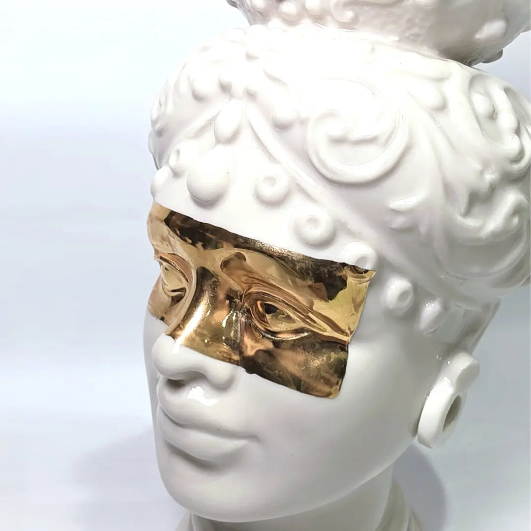 Teste di Moro con Maschera Dorata